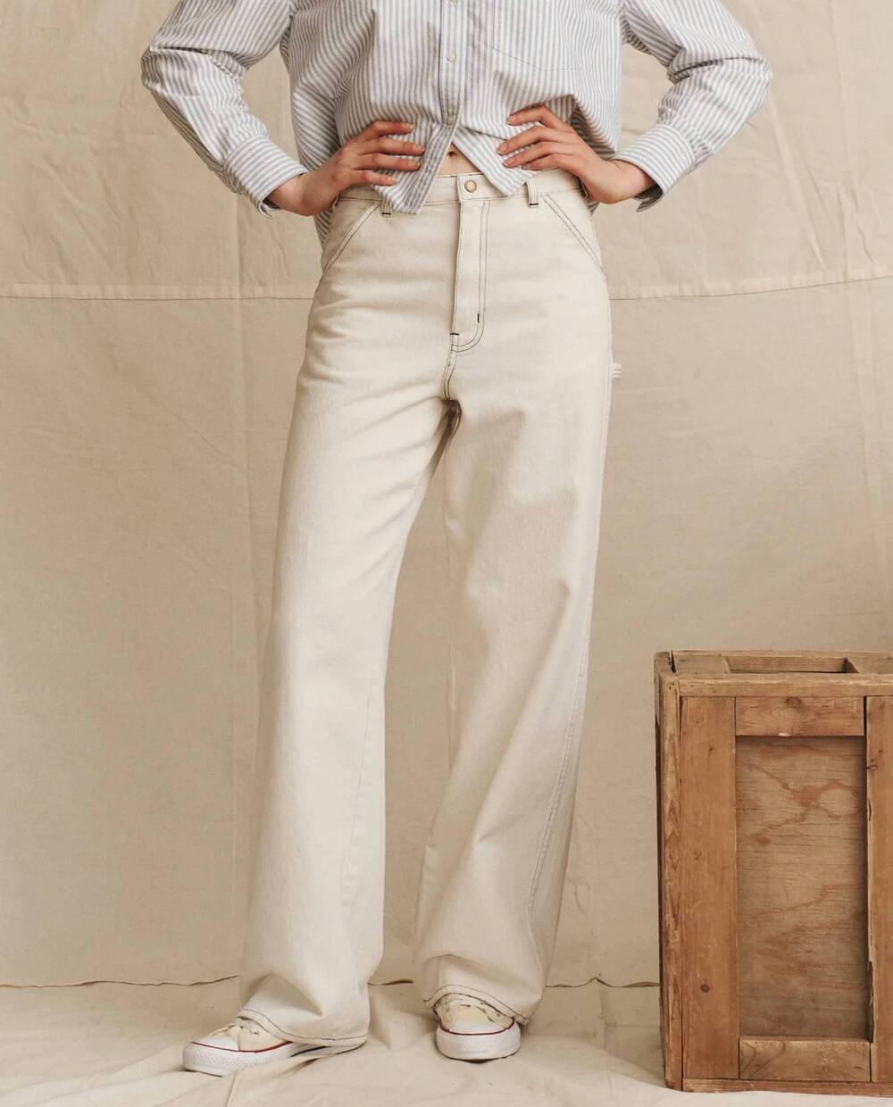 NEW THE GREAT. mill slouchy mid-rise jean in natural with navy stitching